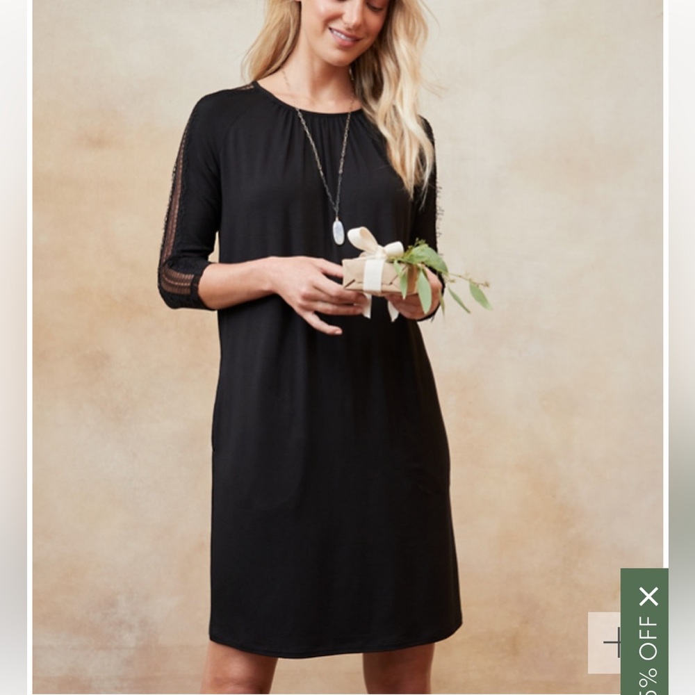 Garnet Hill women’s Luna lace-inset knit dress. Black